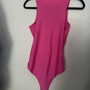Vibrant Pink Sleeveless Bodysuit with High-Cut Design